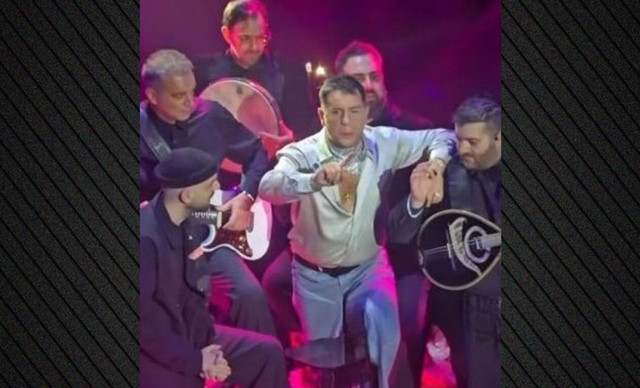 &Alpha;&pi;&rho;ό&omicron;&pi;&tau;&omicron; &sigma;&tau;&eta; &sigma;&kappa;&eta;&nu;ή &gamma;&iota;&alpha; &tau;&omicron;&nu; &Gamma;&iota;ώ&rho;&gamma;&omicron; &Mu;&alpha;&zeta;&omega;&nu;ά&kappa;&eta;: &Tau;&iota; &sigma;&upsilon;&nu;έ&beta;&eta;; &Tau;&omicron; &alpha;&pi;ί&sigma;&tau;&epsilon;&upsilon;&tau;&omicron; &pi;&epsilon;&rho;&iota;&sigma;&tau;&alpha;&tau;&iota;&kappa;ό